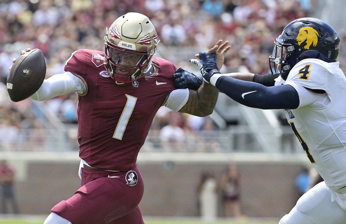 Sep 6, 2025; Tallahassee, Florida, USA; Florida State Seminoles quarterback Tommy Castellanos (1) runs the ball during the first half against the East Texas A&M Lions at Doak S. Campbell Stadium. Mandatory Credit: Melina Myers-Imagn Images