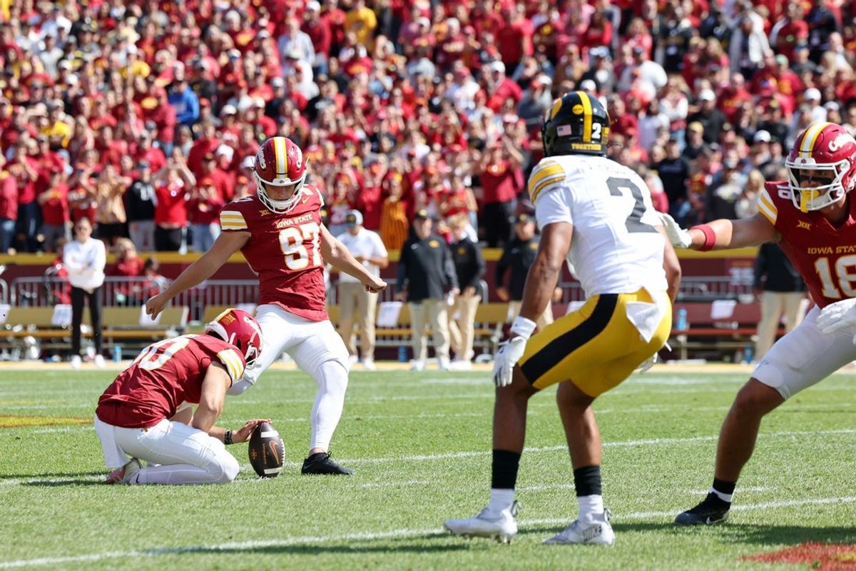 Sep 6, 2025; Ames, Iowa, USA; Iowa State Cyclones place kicker Kyle Konrardy (97) attempts a field goal against the Iowa Hawkeyes during the first quarter at Jack Trice Stadium. Mandatory Credit: Reese Strickland-Imagn Images