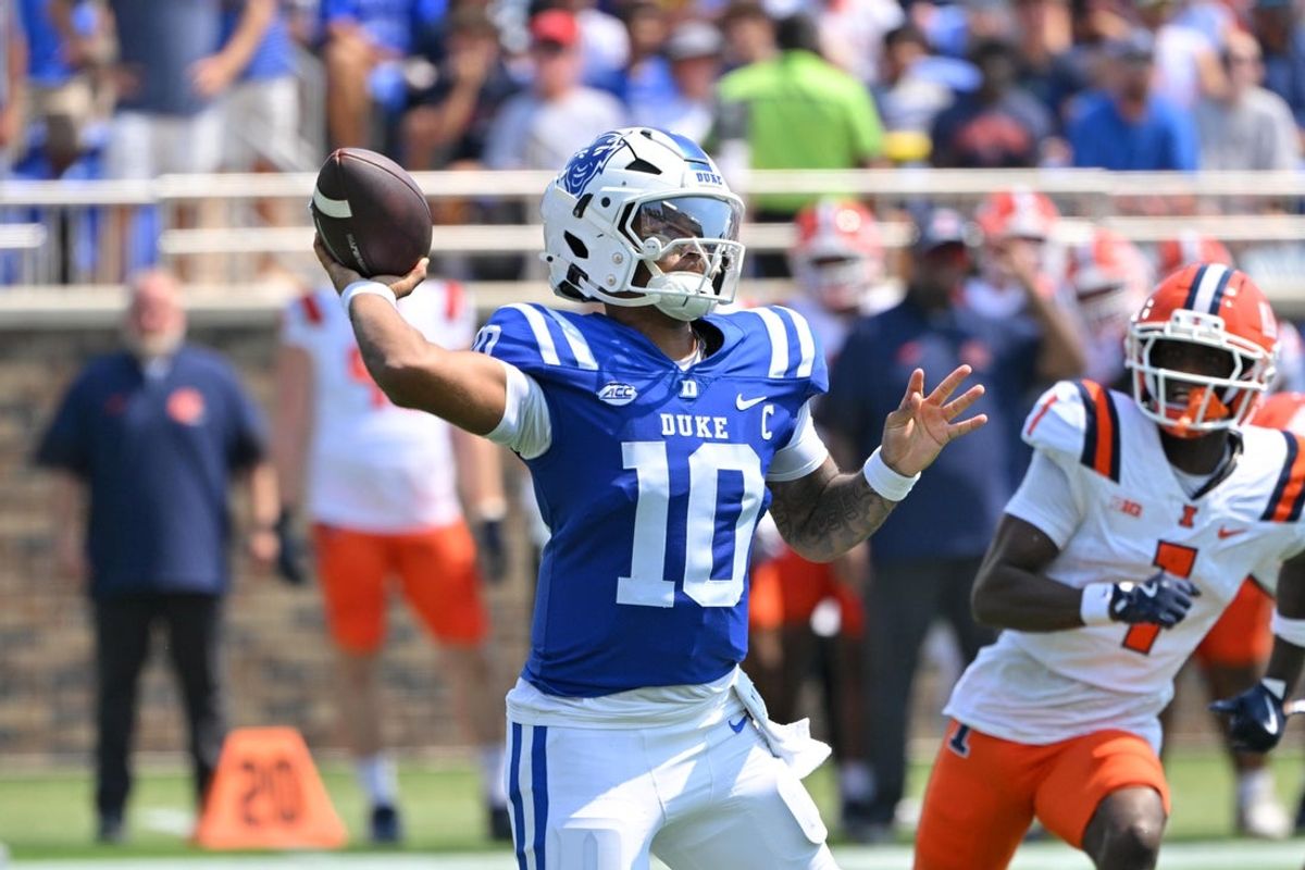 Sep 6, 2025; Durham, North Carolina, USA;  Duke Blue Devils quarterback Darian Mensah (10) throws a pass during the first quarter against the Illinois Fighting Illini at Wallace Wade Stadium. Mandatory Credit: Zachary Taft-Imagn Images