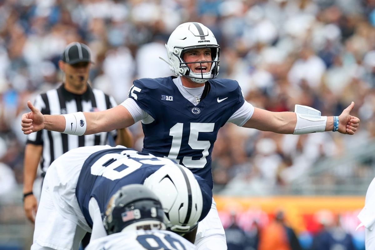 Sep 6, 2025; University Park, Pennsylvania, USA; Penn State Nittany Lions quarterback Drew Allar (15) gestures at the line of scrimmage during the first quarter against the Florida International Panthers at Beaver Stadium. Mandatory Credit: Matthew O'Haren-Imagn Images