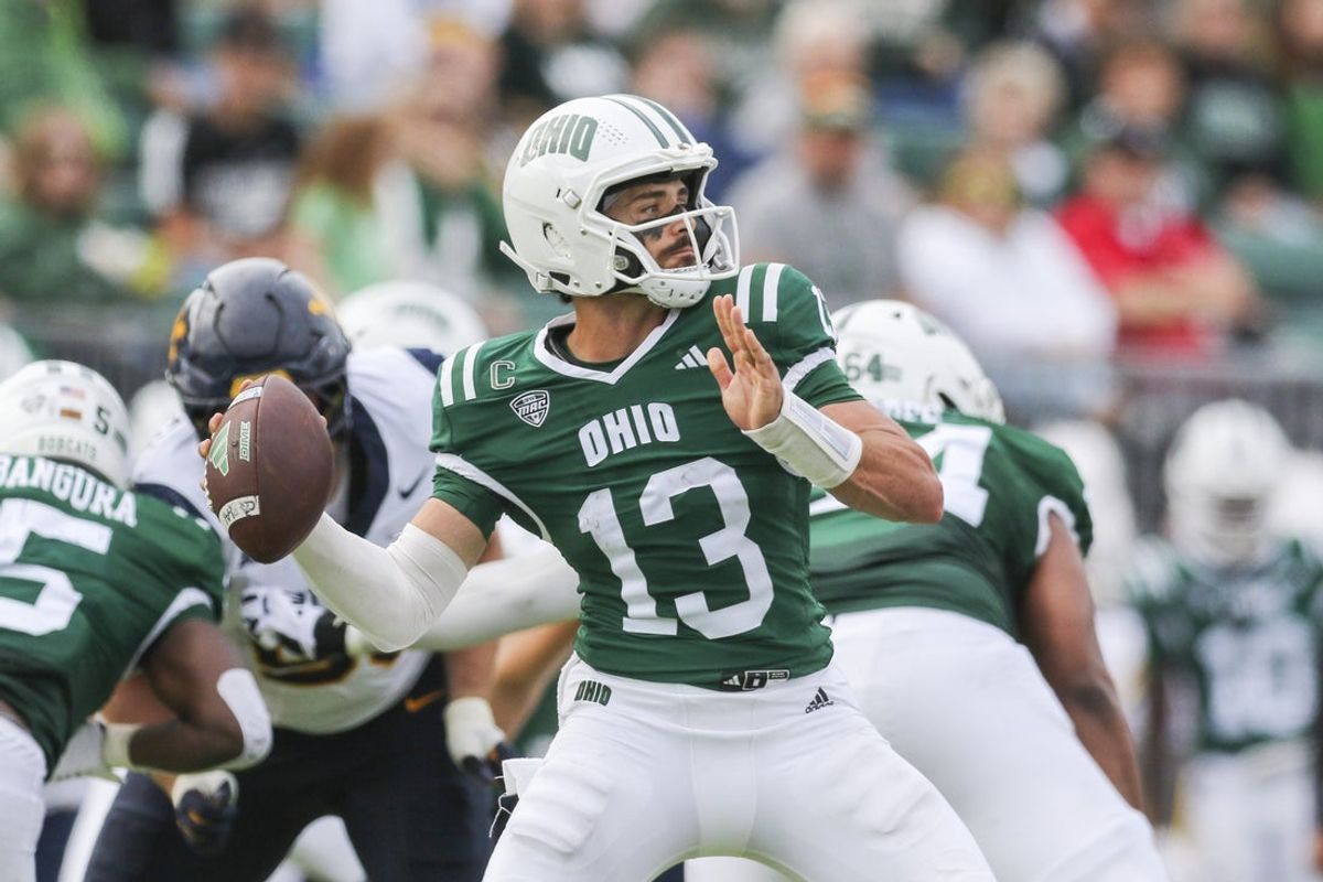 Sep 6, 2025; Athens, Ohio, USA; Ohio Bobcats quarterback Parker Navarro (13) throws a pass during the second quarter against the West Virginia Mountaineers at Peden Stadium. Mandatory Credit: Ben Queen-Imagn Images