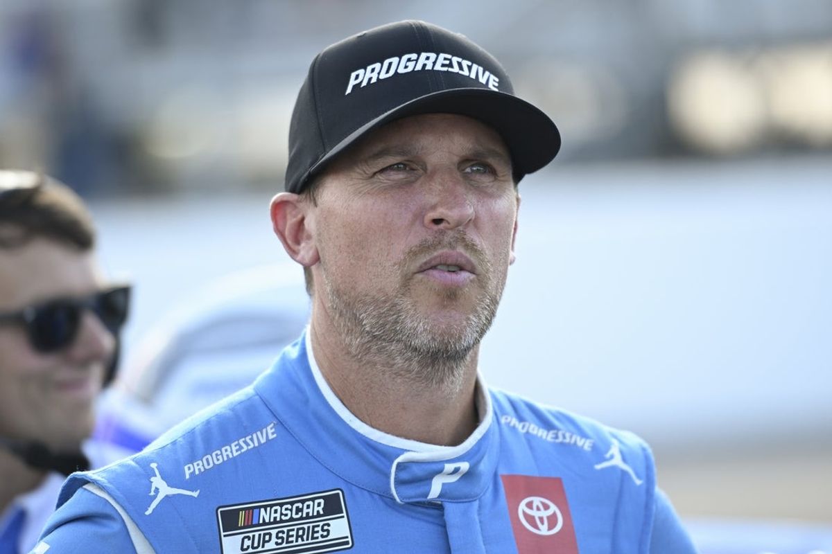 Sep 6, 2025; Madison, Illinois, USA; NASCAR Cup Series driver Denny Hamlin (11) looks on during practice and qualifying for the Enjoy Illinois 300 at World Wide Technology Raceway. Mandatory Credit: Joe Puetz-Imagn Images