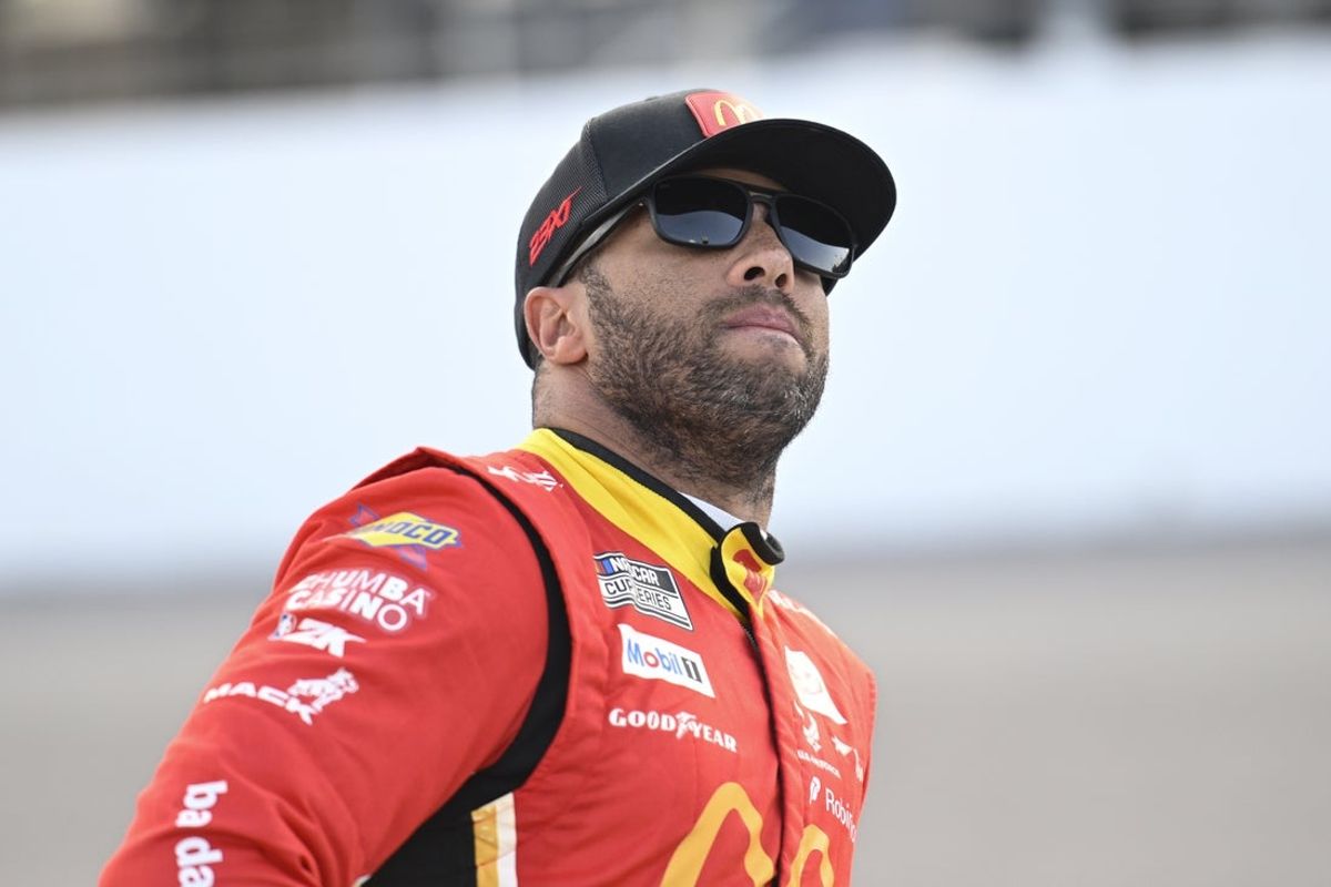 Sep 6, 2025; Madison, Illinois, USA; NASCAR Cup Series driver Bubba Wallace (23) looks on during practice and qualifying for the Enjoy Illinois 300 at World Wide Technology Raceway. Mandatory Credit: Joe Puetz-Imagn Images