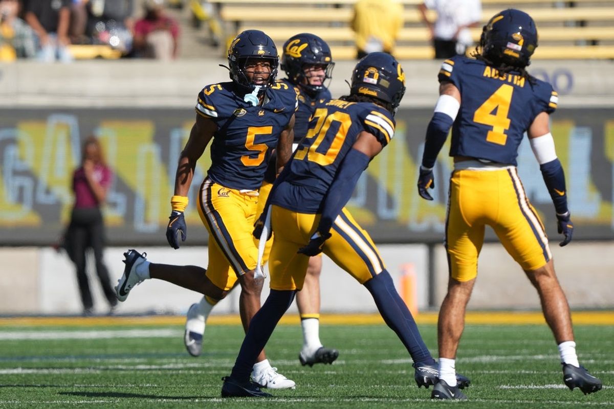 Sep 6, 2025; Berkeley, California, USA; California Golden Bears defensive back Hezekiah Masses (5) reacts after intercepting a pass against the Texas Southern Tigers during the second quarter at California Memorial Stadium. Mandatory Credit: Darren Yamashita-Imagn Images