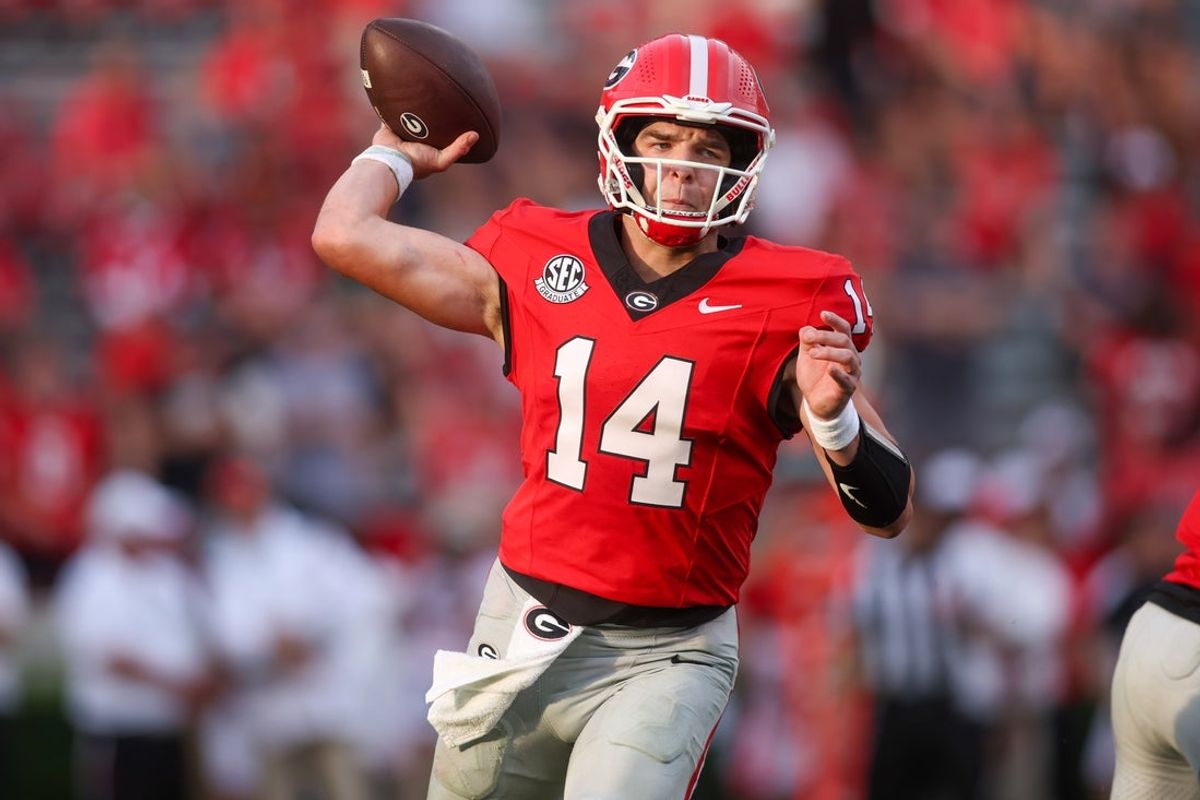 Sep 6, 2025; Athens, Georgia, USA; Georgia Bulldogs quarterback Gunner Stockton (14) throws a pass against the Austin Peay Governors in the fourth quarter at Sanford Stadium. Mandatory Credit: Brett Davis-Imagn Images