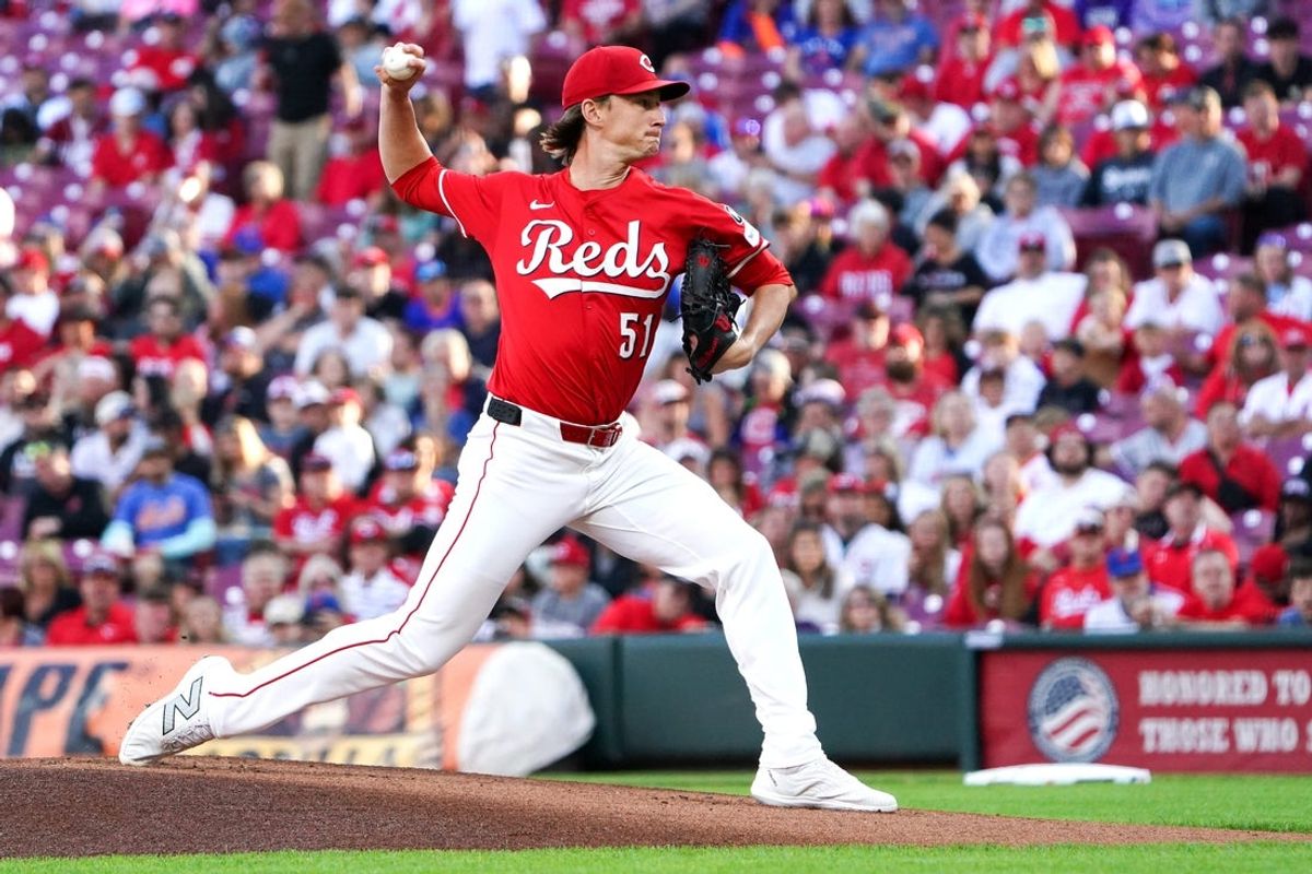 Sep 6, 2025; Cincinnati, Ohio, USA; Cincinnati Reds pitcher Brady Singer (51) delivers a pitch in the first inning of a MLB game between the Cincinnati Reds and New York Mets, Saturday, Sept. 6, 2025, at Great American Ball Park in downtown Cincinnati. Mandatory Credit: Frank Bowen IV-USA TODAY Network via Imagn Images