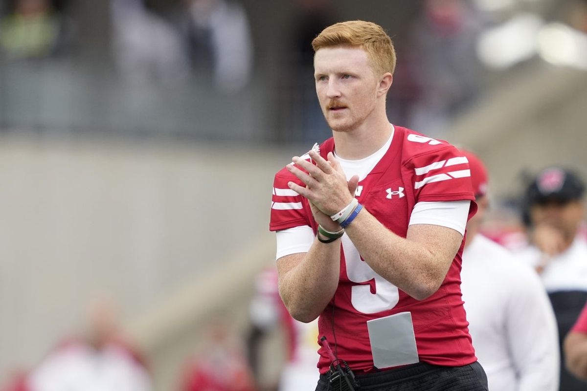 Sep 6, 2025; Madison, Wisconsin, USA; Wisconsin Badgers quarterback Billy Edwards Jr. (9) reacts to a play against the Middle Tennessee Blue Raiders during the second half at Camp Randall Stadium. Mandatory Credit: Kayla Wolf-Imagn Images