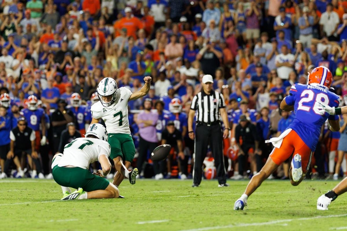 Sep 6, 2025; Gainesville, Florida, USA; South Florida Bulls place kicker Nico Gramatica (7) kicks a field goal to win the game against the Florida Gators during the second half at Ben Hill Griffin Stadium. Mandatory Credit: Matt Pendleton-Imagn Images