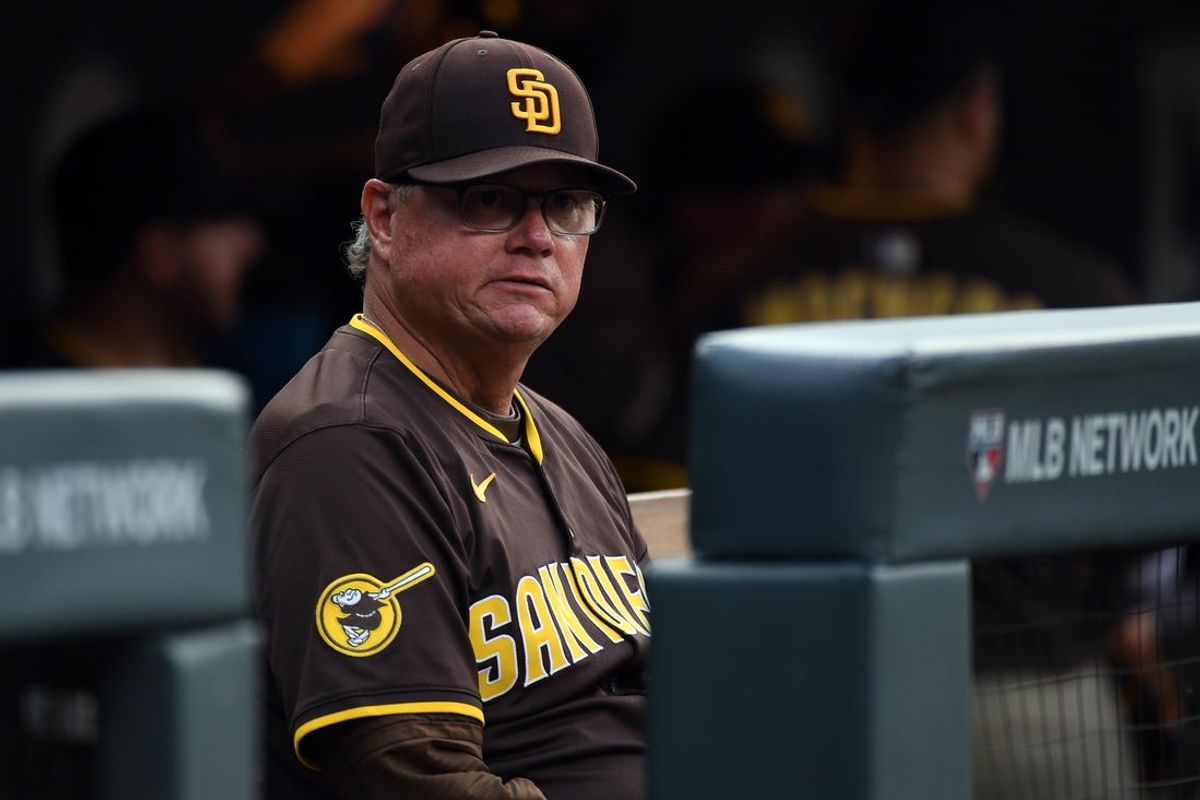 Sep 6, 2025; Denver, Colorado, USA; San Diego Padres manager Mike Shildt (8) looks on from the bench before the game against the Colorado Rockies at Coors Field. Mandatory Credit: Christopher Hanewinckel-Imagn Images