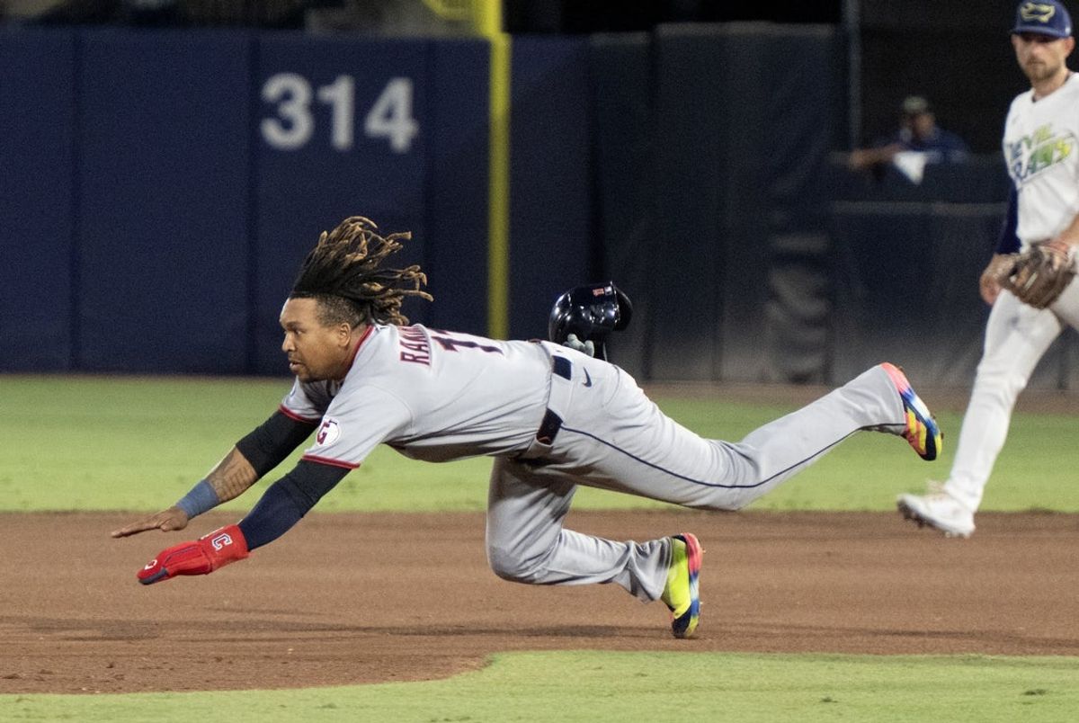 Sep 6, 2025; St. Petersburg, Florida, USA; Cleveland Guardians Jose Ramirez (11) dives into second base in the fourth inning during thier game with the Tampa Bay Rays at George M. Steinbrenner Field. Mandatory Credit: Chris Tilley-Imagn Images