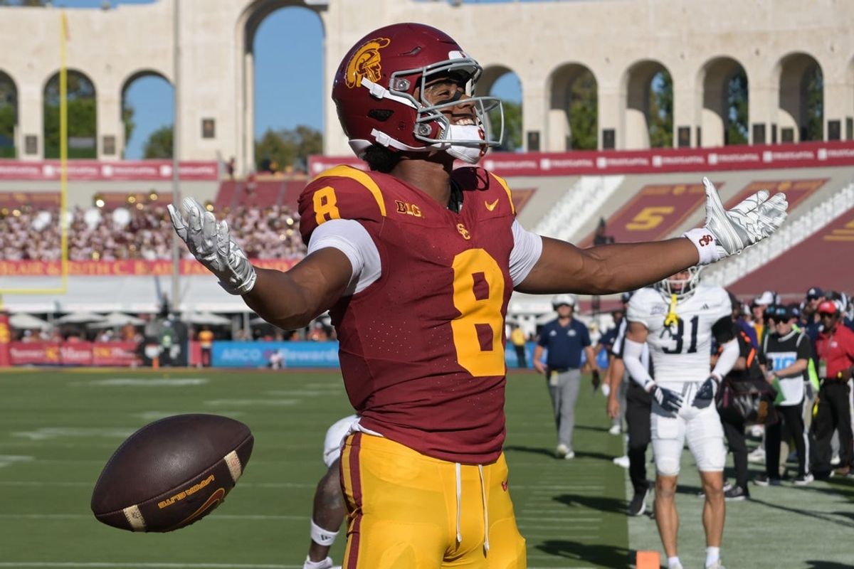 Sep 6, 2025; Los Angeles, California, USA;  USC Trojans quarterback Jayden Maiava (14) throws a pass during the first half against the Georgia Southern Eagles at United Airlines Field at the Los Angeles Memorial Coliseum. Mandatory Credit: Jayne Kamin-Oncea-Imagn Images