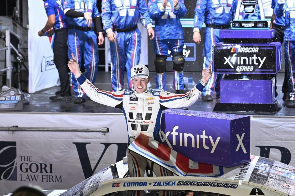 Sep 6, 2025; Madison, Illinois, USA; NASCAR Xfinity Series driver Connor Zilisch (88) celebrates after winning the Nu Way 200 Sauced by Blues Hog at World Wide Technology Raceway. Mandatory Credit: Joe Puetz-Imagn Images