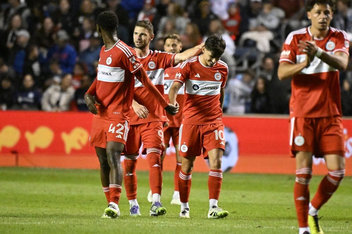 Sep 6, 2025; Bridgeview, Illinois, USA;  Chicago Fire forward Hugo Cuypers (9), center, celebrates with teammates after scoring a goal against the New England Revolution during the second half at SeatGeek Stadium. Mandatory Credit: Matt Marton-Imagn Images