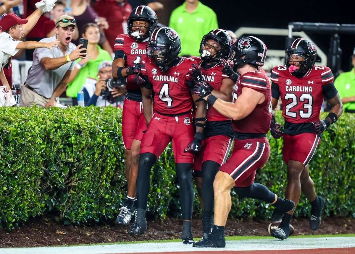 Sep 6, 2025; Columbia, South Carolina, USA; South Carolina Gamecocks defensive back Vicari Swain (4) celebrates his second punt return touchdown against the South Carolina State Bulldogs in the second quarter at Williams-Brice Stadium. Mandatory Credit: Jeff Blake-Imagn Images