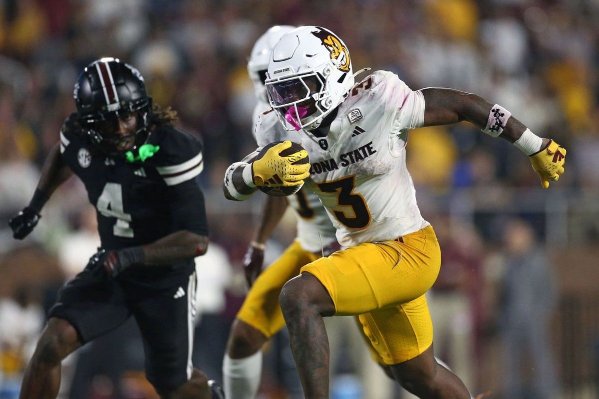 Sep 6, 2025; Starkville, Mississippi, USA; Arizona State Sun Devils running back Raleek Brown (3) runs the ball for  first down during the fourth quarter against the Mississippi State Bulldogs at Davis Wade Stadium at Scott Field. Mandatory Credit: Petre Thomas-Imagn Images