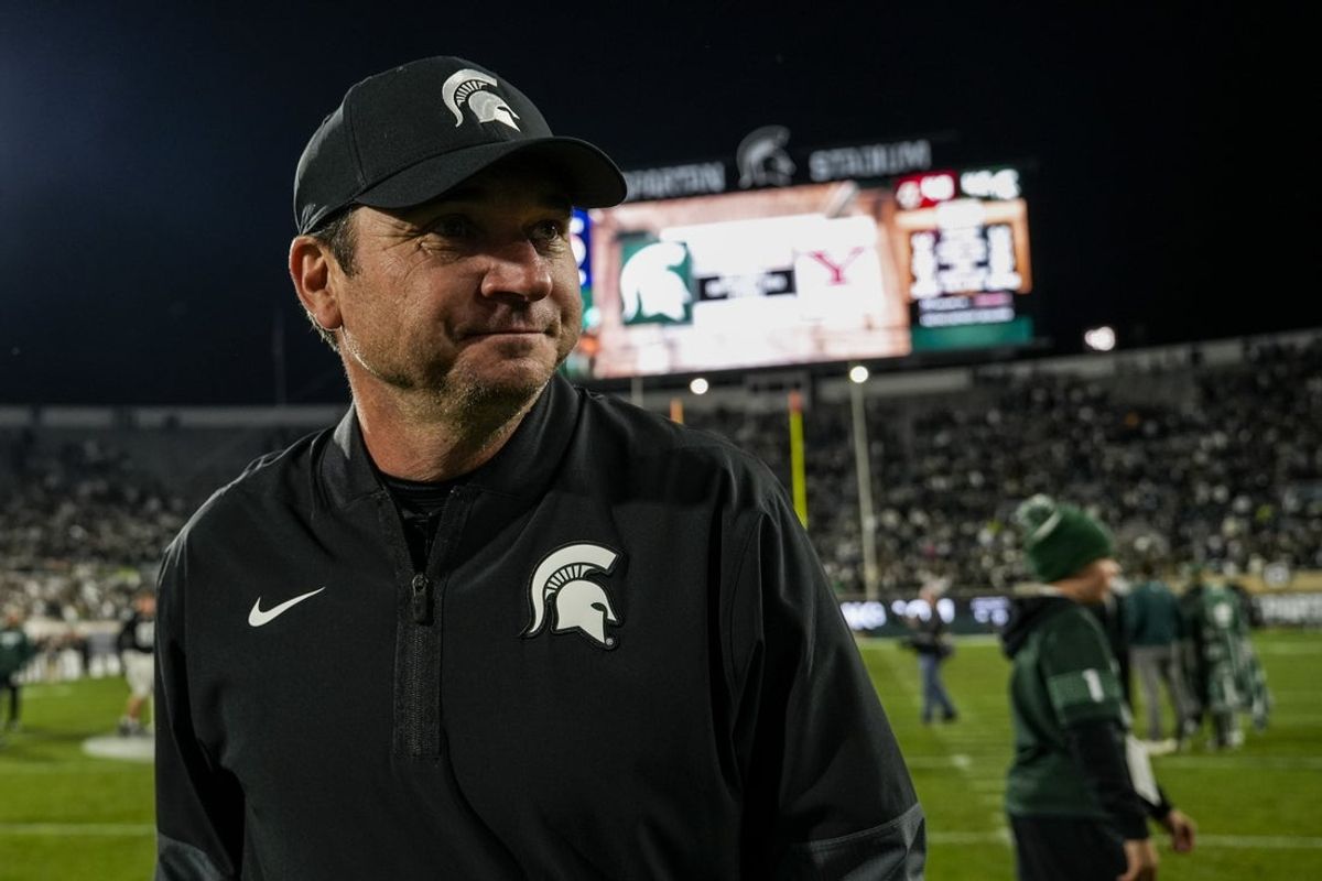 Sep 6, 2025; East Lansing, Michigan, USA; Michigan State head coach Jonathan Smith walks across the field following  a double-overtime victory over Boston College at Spartan Stadium. Mandatory Credit: Brendan Mullin-Imagn Images