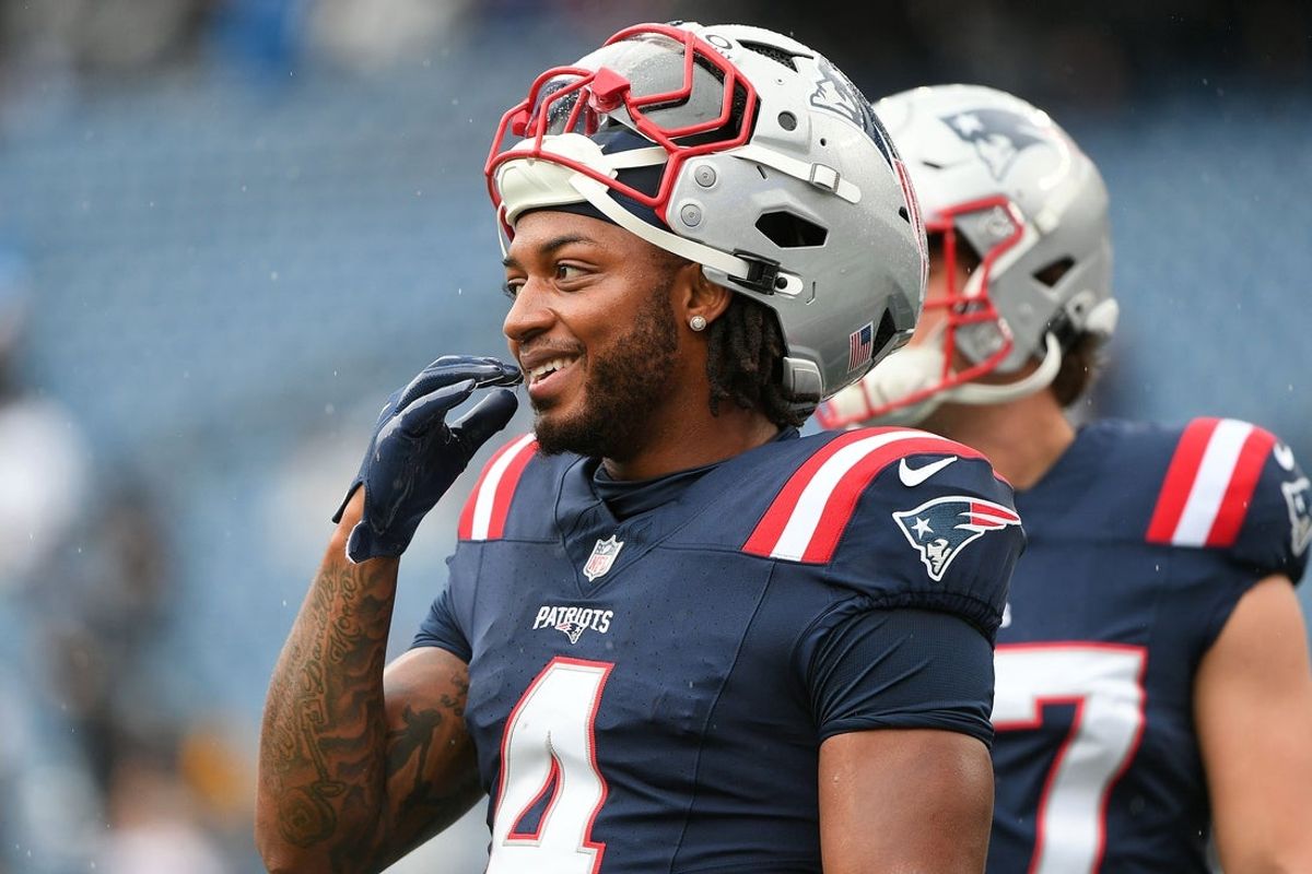 Sep 7, 2025; Foxborough, Massachusetts, USA; New England Patriots running back Antonio Gibson (4) practices before the game against the Las Vegas Raiders at Gillette Stadium. Mandatory Credit: Bob DeChiara-Imagn Images