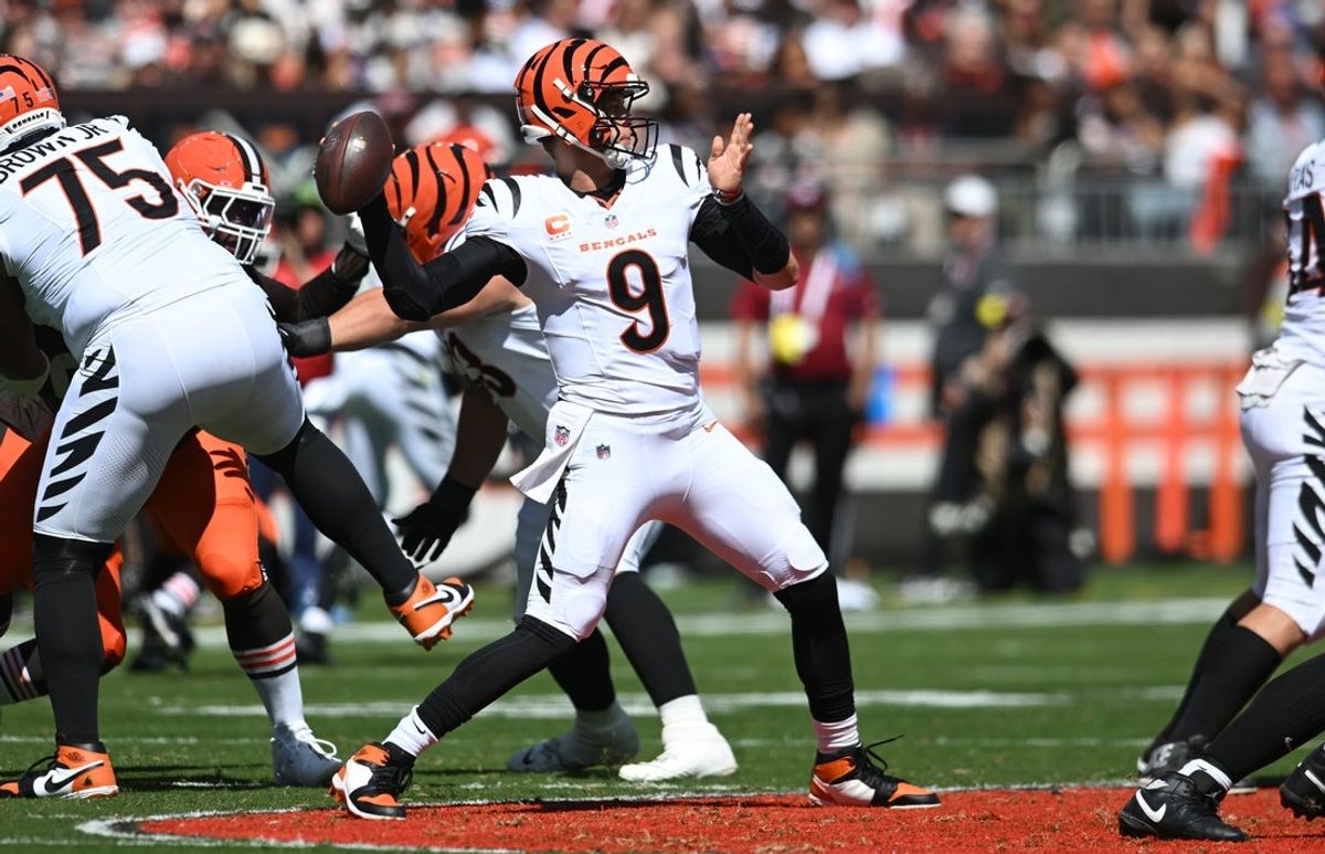 Sep 7, 2025; Cleveland, Ohio, USA; Cincinnati Bengals quarterback Joe Burrow (9) throws during the first half against the Cleveland Browns at Huntington Bank Field. Mandatory Credit: Ken Blaze-Imagn Images