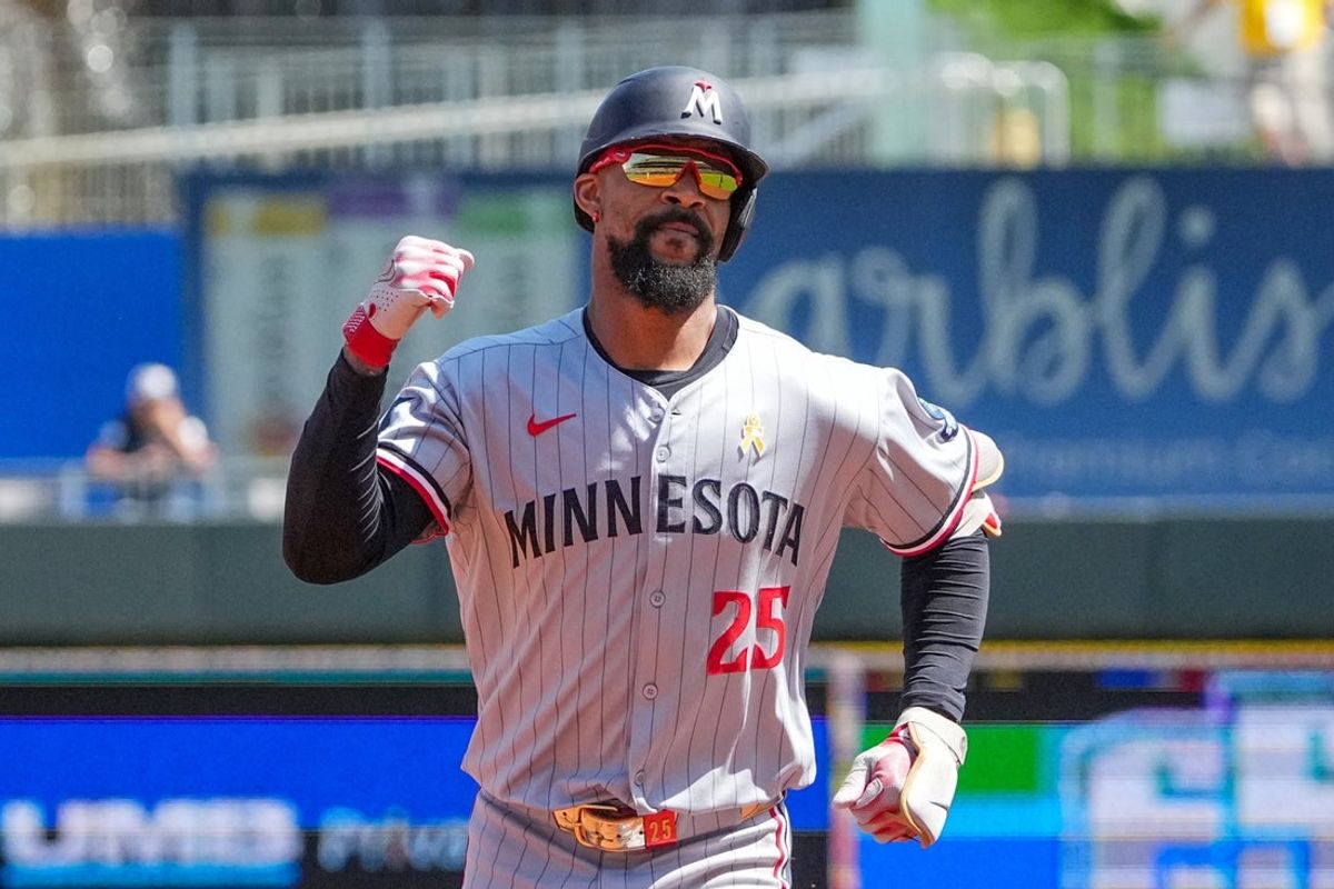 Sep 7, 2025; Kansas City, Missouri, USA; Minnesota Twins center fielder Byron Buxton (25) celebrates while running the bases after hitting a solo home run against the Kansas City Royals during the first inning at Kauffman Stadium. Mandatory Credit: Denny Medley-Imagn Images