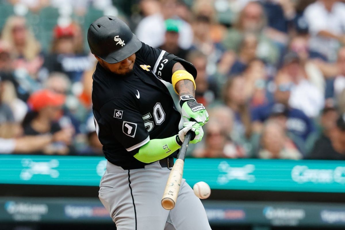 Sep 7, 2025; Detroit, Michigan, USA; Chicago White Sox second base Lenyn Sosa (50) hits a two hits an RBI single in the eighth inning against the Detroit Tigers at Comerica Park. Mandatory Credit: Rick Osentoski-Imagn Images