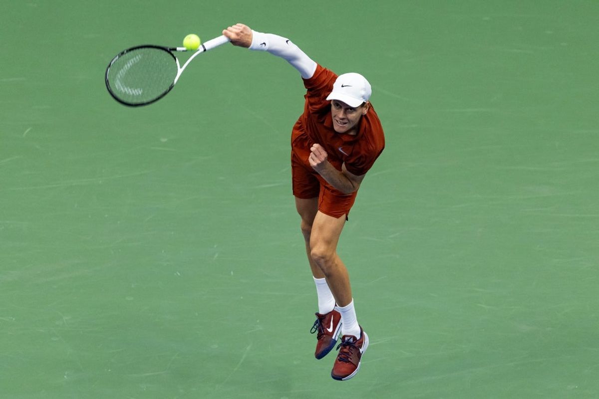 Sep 7, 2025; Flushing, NY, USA; Jannik Sinner of Italy serves against Carlos Alcaraz of Spain in the final of the men’s singles at the US Open at Arthur Ashe Stadium in Billie Jean King National Tennis Center. Mandatory Credit: Mike Frey-Imagn Images