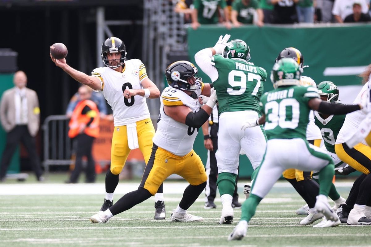 Sep 7, 2025; East Rutherford, New Jersey, USA; Pittsburgh Steelers quarterback Aaron Rodgers (8) shows the ball during the second half against the New York Jets at MetLife Stadium. Mandatory Credit: Wendell Cruz-Imagn Images
