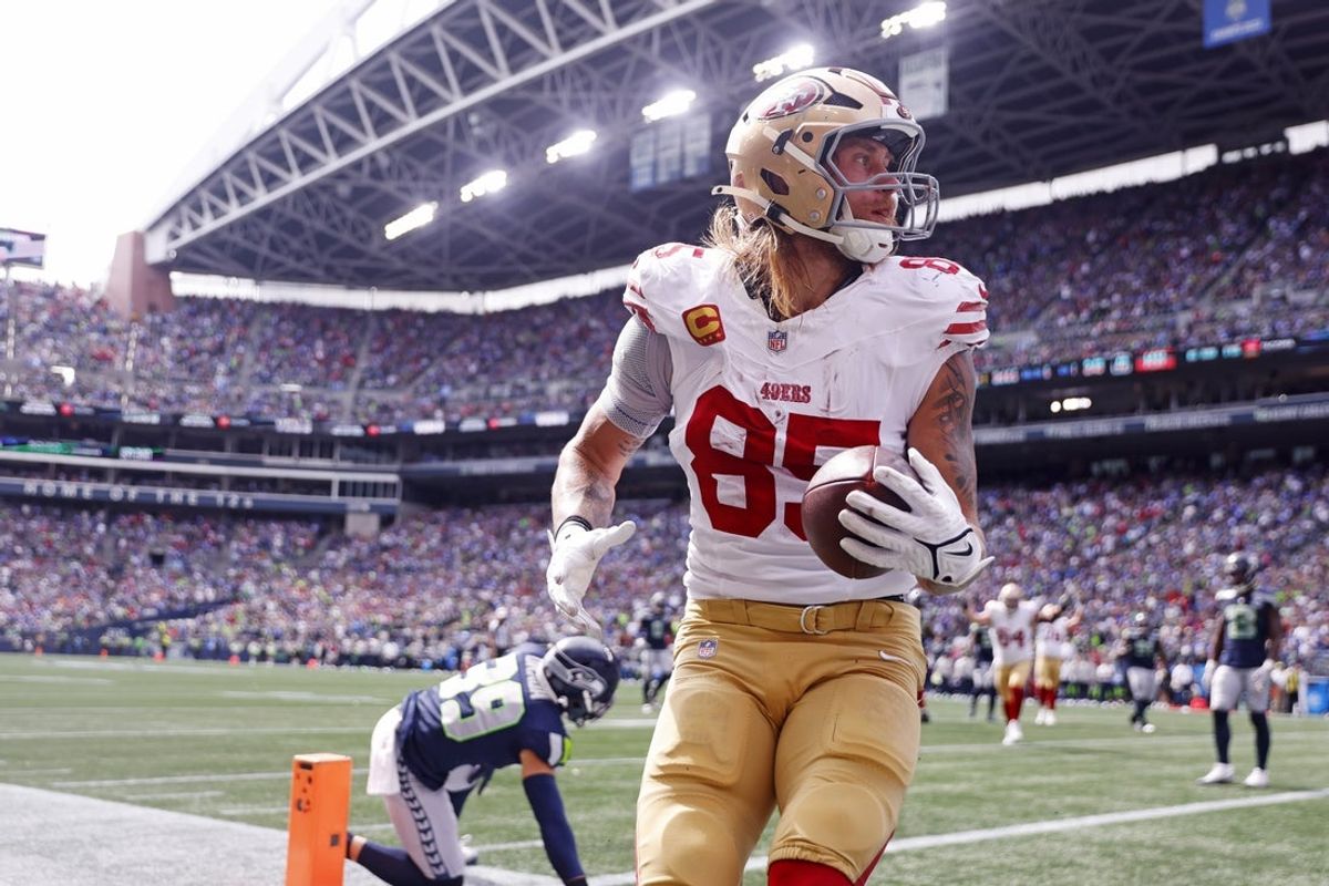 Sep 7, 2025; Seattle, Washington, USA; San Francisco 49ers tight end George Kittle (85) celebrates after scoring a touchdown during the first half against the Seattle Seahawks during the first quarter at Lumen Field. Mandatory Credit: Joe Nicholson-Imagn Images