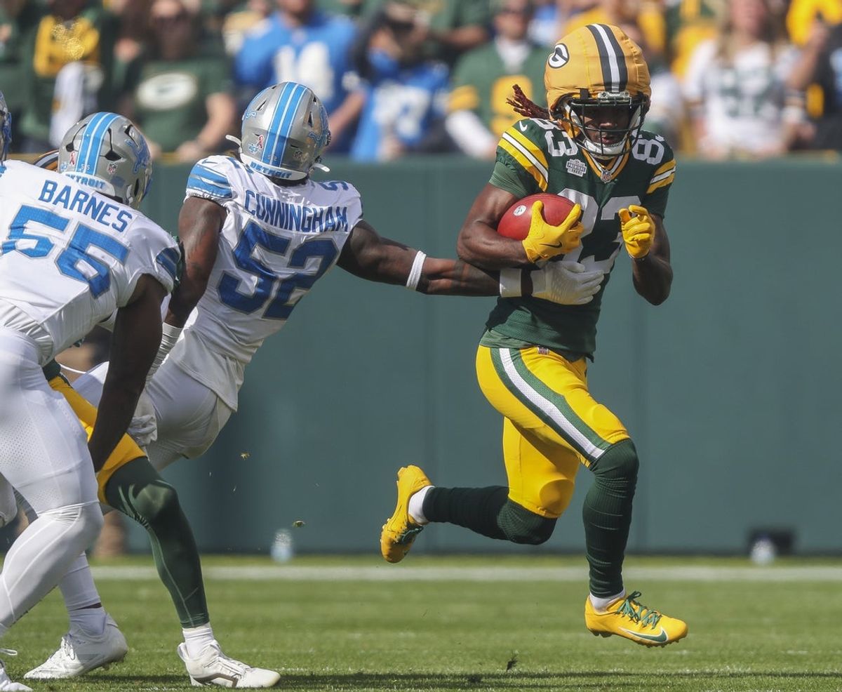 Sep 7, 2025; Green Bay, Wisconsin, USA; Green Bay Packers wide receiver Savion Williams (83) returns a kickoff against the Detroit Lions during the first half at Lambeau Field. Mandatory Credit: Tork Mason-USA TODAY Network via Imagn Images