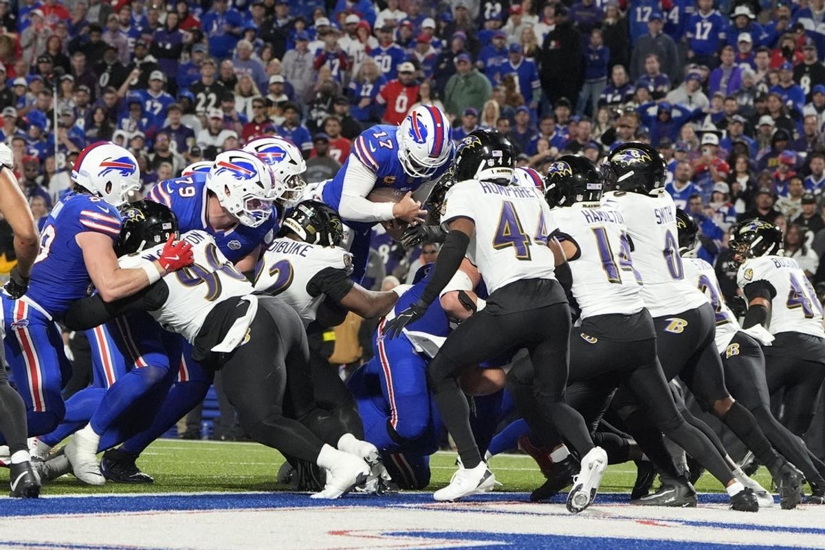 Sep 7, 2025; Orchard Park, New York, USA;  Buffalo Bills quarterback Josh Allen (17) scores a touchdown  during the fourth quarter against the Baltimore Ravens at Highmark Stadium. Mandatory Credit: Gregory Fisher-Imagn Images