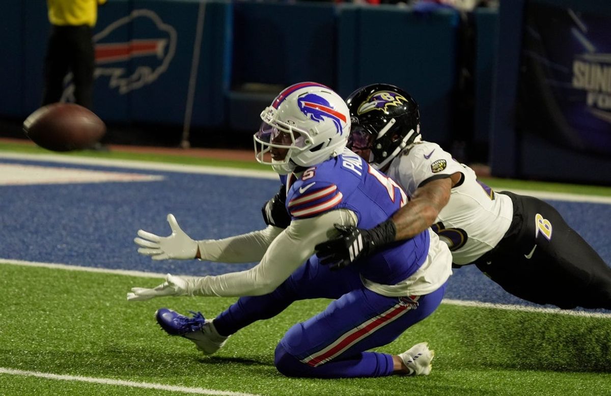Buffalo Bills wide receiver Joshua Palmer gets held by Baltimore Ravens cornerback Jaire Alexander while trying to catch the pass during the second half of their game against the Baltimore Ravens at Highmark Stadium in Orchard Park on Sept. 7, 2025. The Ravens received a penalty for the pass interference.