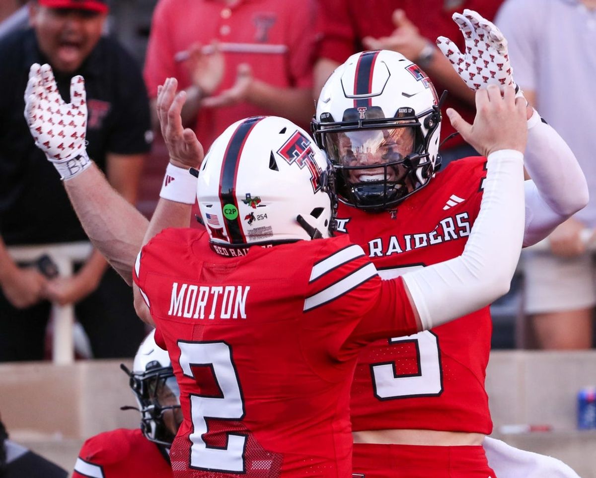 Texas Tech's Coy Eakin celebrates his touchdown catch with Behren Morton (2) against Arkansas-Pine Bluff during a non-conference football game, Saturday, August 30, 2025, at Jones AT&T Stadium.