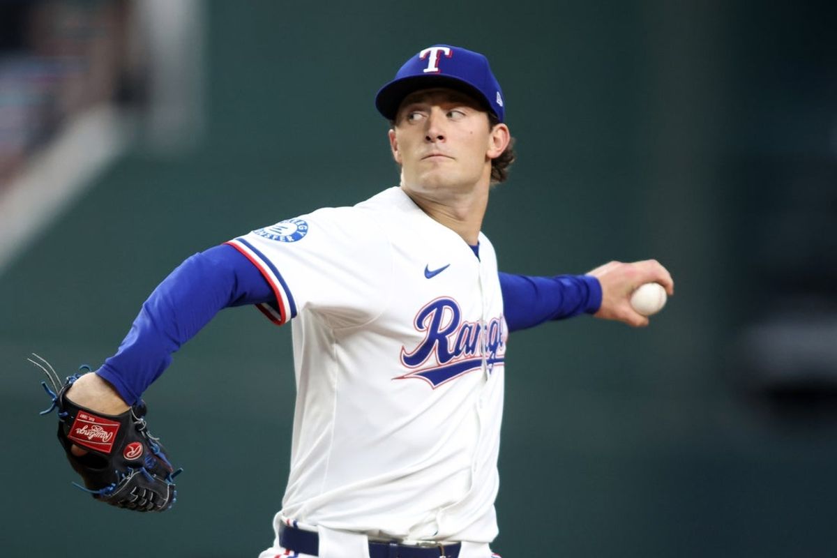 Sep 8, 2025; Arlington, Texas, USA; Texas Rangers relief pitcher Jacob Latz (67) throws a pitch against the Milwaukee Brewers during the second inning at Globe Life Field. Mandatory Credit: Tim Heitman-Imagn Images