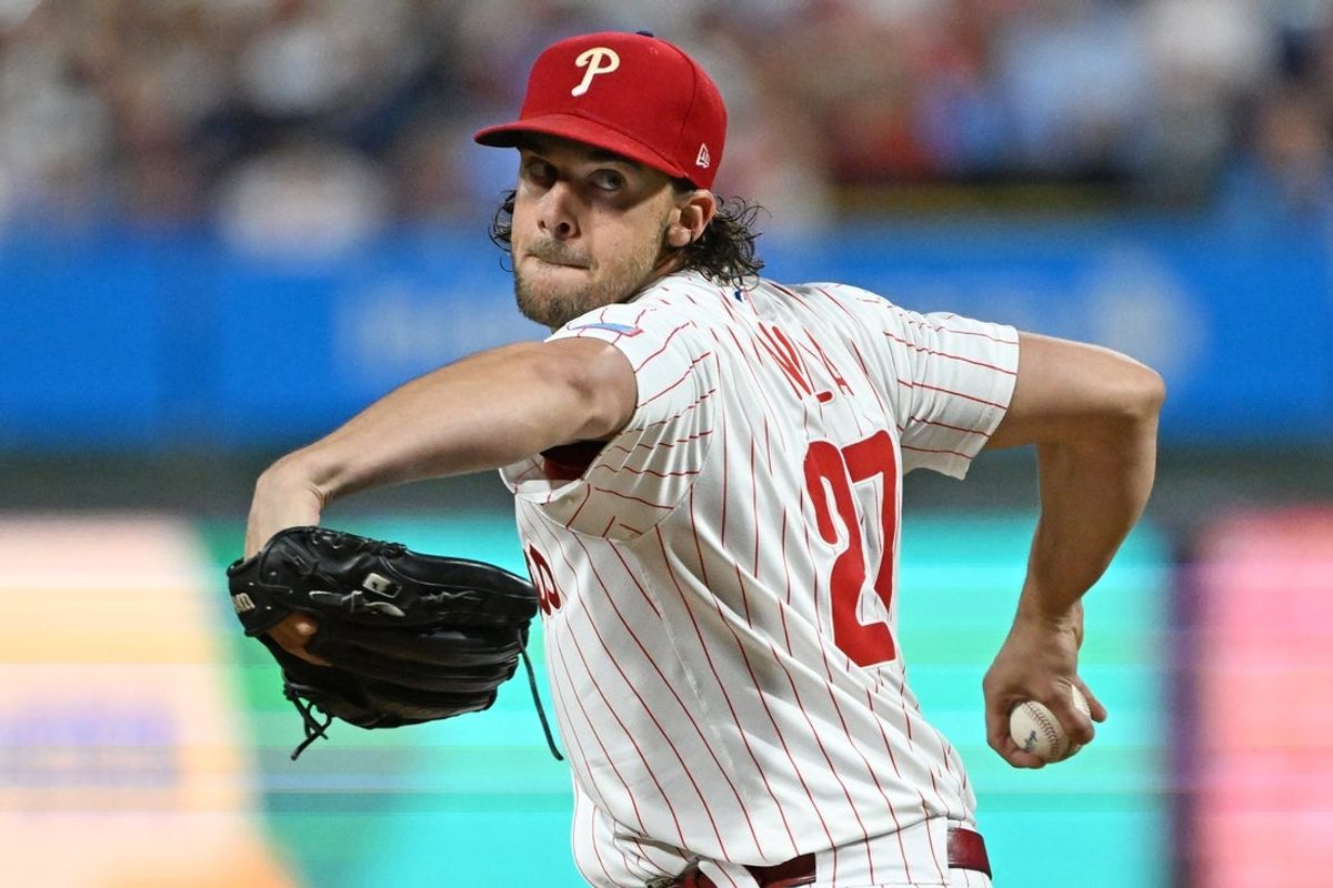 Sep 8, 2025; Philadelphia, Pennsylvania, USA; Philadelphia Phillies pitcher Aaron Nola (27) throws a pitch during the fourth inning against the New York Mets at Citizens Bank Park. Mandatory Credit: Eric Hartline-Imagn Images