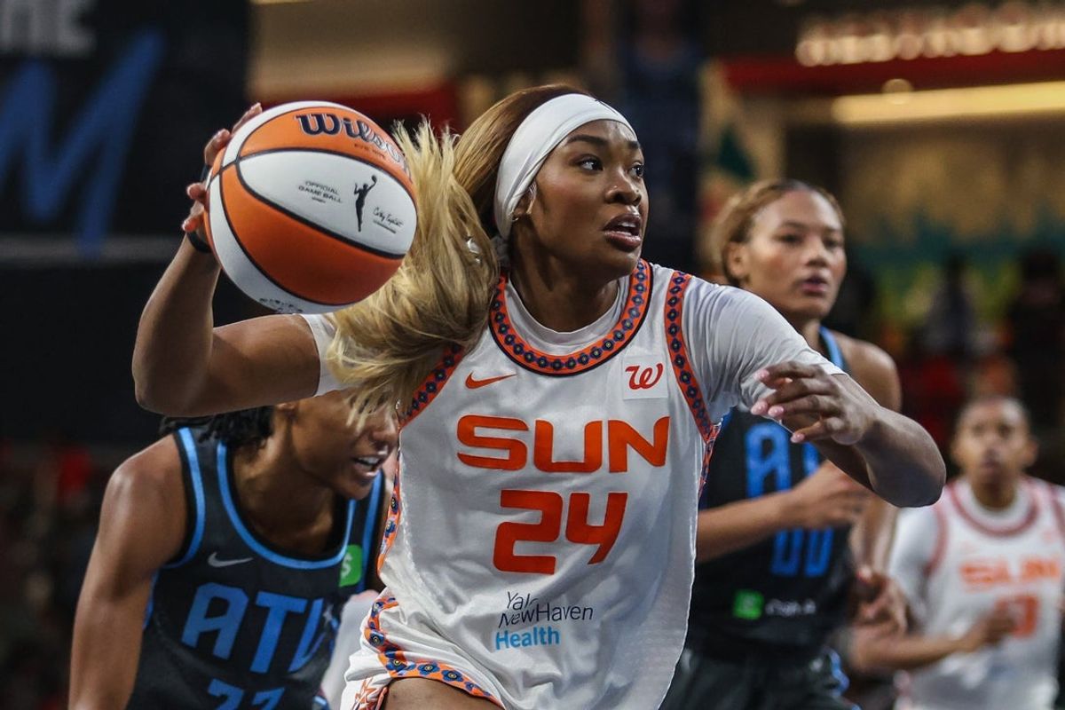 Sep 8, 2025; College Park, Georgia, USA; Connecticut Sun forward Aneesah Morrow (24) dribbles the ball towards the basket in the game against the Atlanta Dream during the fourth quarter at Gateway Center Arena at College Park. Mandatory Credit: Jordan Godfree-Imagn Images