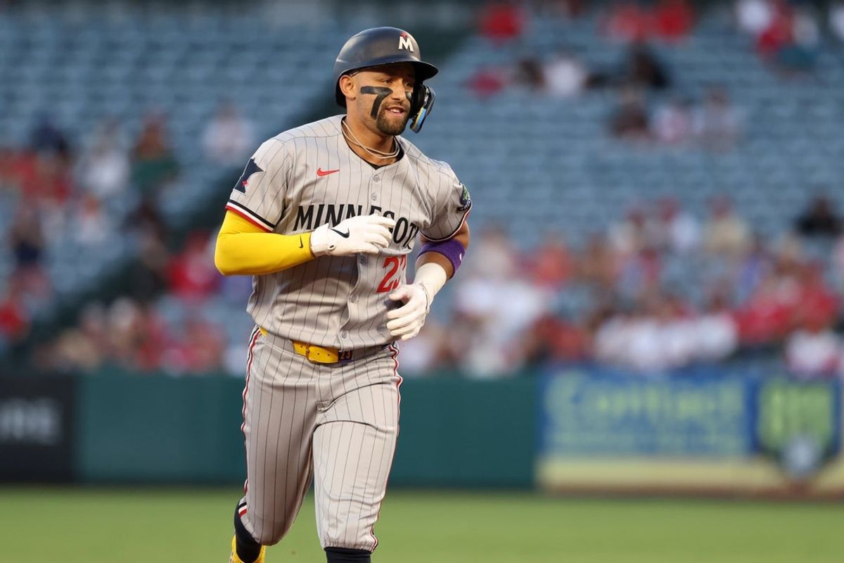 Sep 8, 2025; Anaheim, California, USA;  Minnesota Twins third baseman Royce Lewis (23) runs around bases after hitting a two-run home run during the second inning against the Los Angeles Angels at Angel Stadium. Mandatory Credit: Kiyoshi Mio-Imagn Images