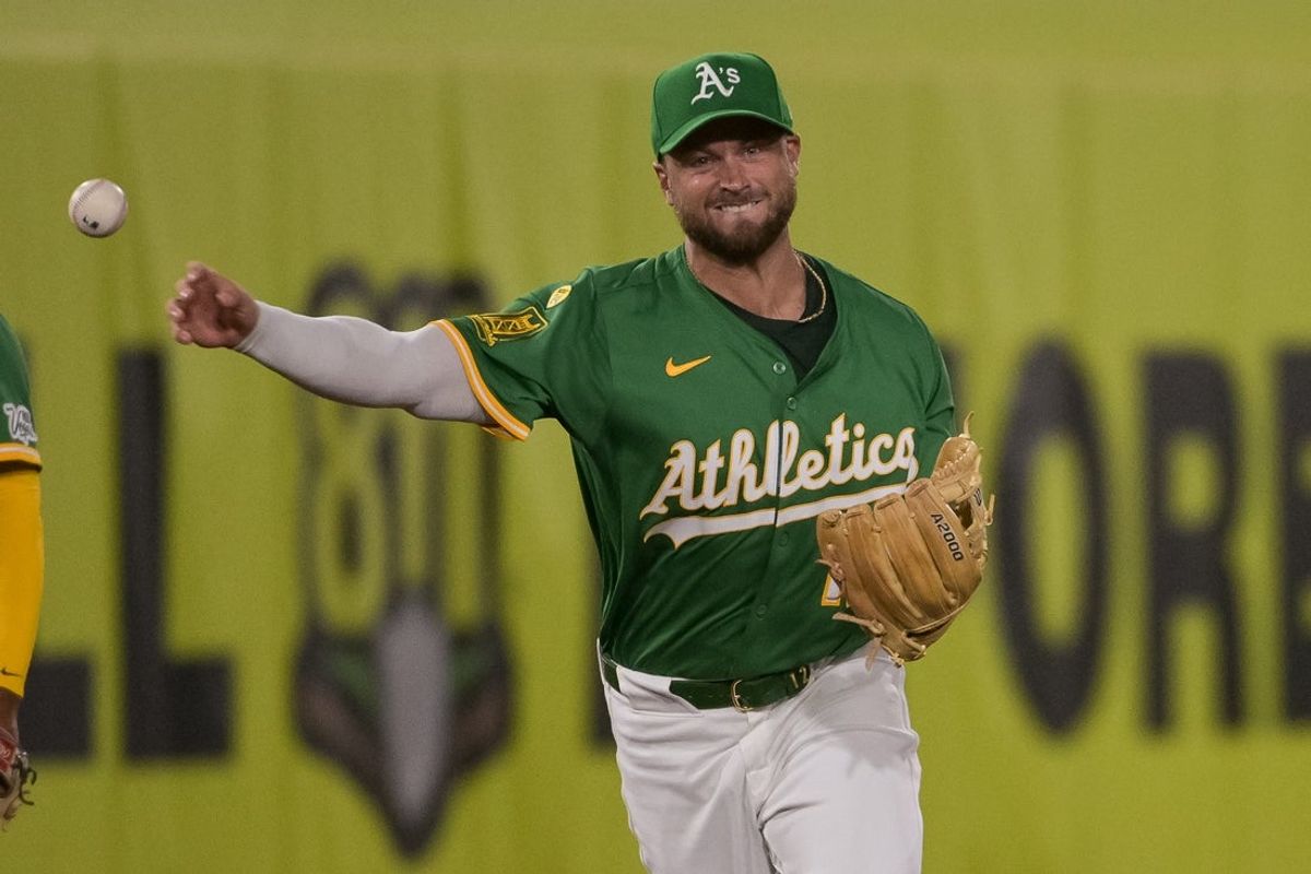 Sep 8, 2025; West Sacramento, California, USA; Athletics third baseman Max Schuemann (12) throws the ball to first against the Boston Red Sox during the third inning at Sutter Health Park. Mandatory Credit: Ed Szczepanski-Imagn Images