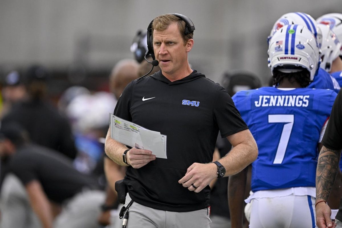 Sep 6, 2025; Dallas, Texas, USA; SMU Mustangs head coach Rhett Lashlee looks on during the game between the SMU Mustangs and the Baylor Bears at Gerald J. Ford Stadium. Mandatory Credit: Jerome Miron-Imagn Images