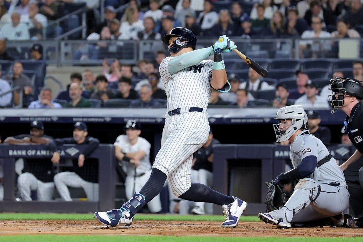Sep 9, 2025; Bronx, New York, USA; New York Yankees right fielder Aaron Judge (99) follows through on a solo home run against the Detroit Tigers during the first inning at Yankee Stadium. Mandatory Credit: Brad Penner-Imagn Images