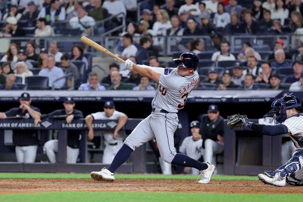 Sep 9, 2025; Bronx, New York, USA; Detroit Tigers designated hitter Kerry Carpenter (30) follows through on a two run triple against the New York Yankees during the seventh inning at Yankee Stadium. Mandatory Credit: Brad Penner-Imagn Images