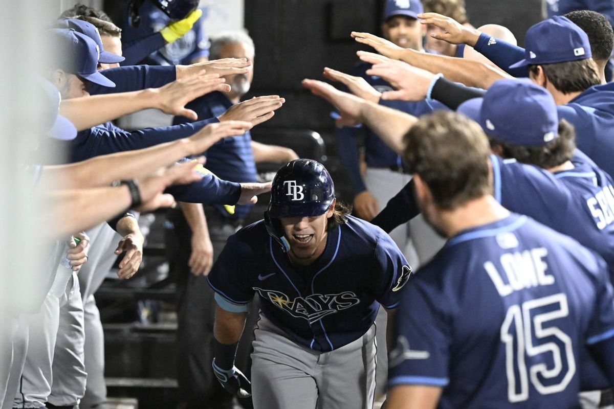 Sep 9, 2025; Chicago, Illinois, USA;  Tampa Bay Rays third baseman Tristan Gray (10) celebrates in the dugout after he hits a home run against the Chicago White Sox during the seventh inning at Rate Field. Mandatory Credit: Matt Marton-Imagn Images