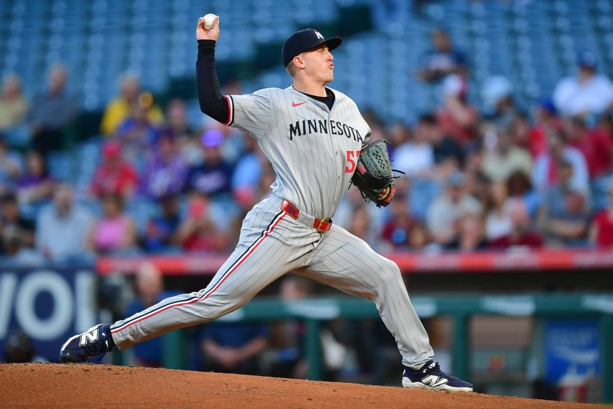 Sep 9, 2025; Anaheim, California, USA; Minnesota Twins pitcher Zebby Matthews (52) throws against the Los Angeles Angels during the first inning at Angel Stadium. Mandatory Credit: Gary A. Vasquez-Imagn Images