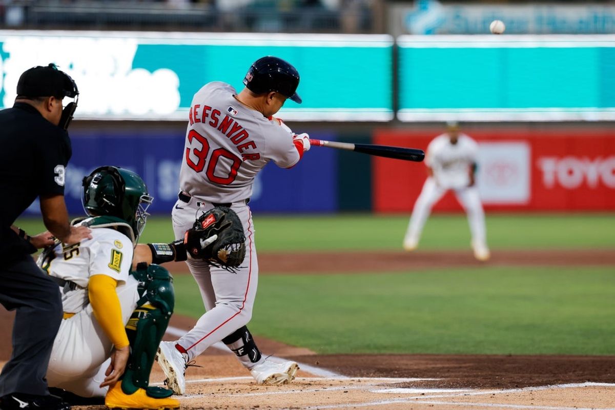 Sep 9, 2025; West Sacramento, California, USA; Boston Red Sox designated hitter Rob Refsnyder (30) hits a three run home run during the first inning against the Athletics at Sutter Health Park. Mandatory Credit: Sergio Estrada-Imagn Images