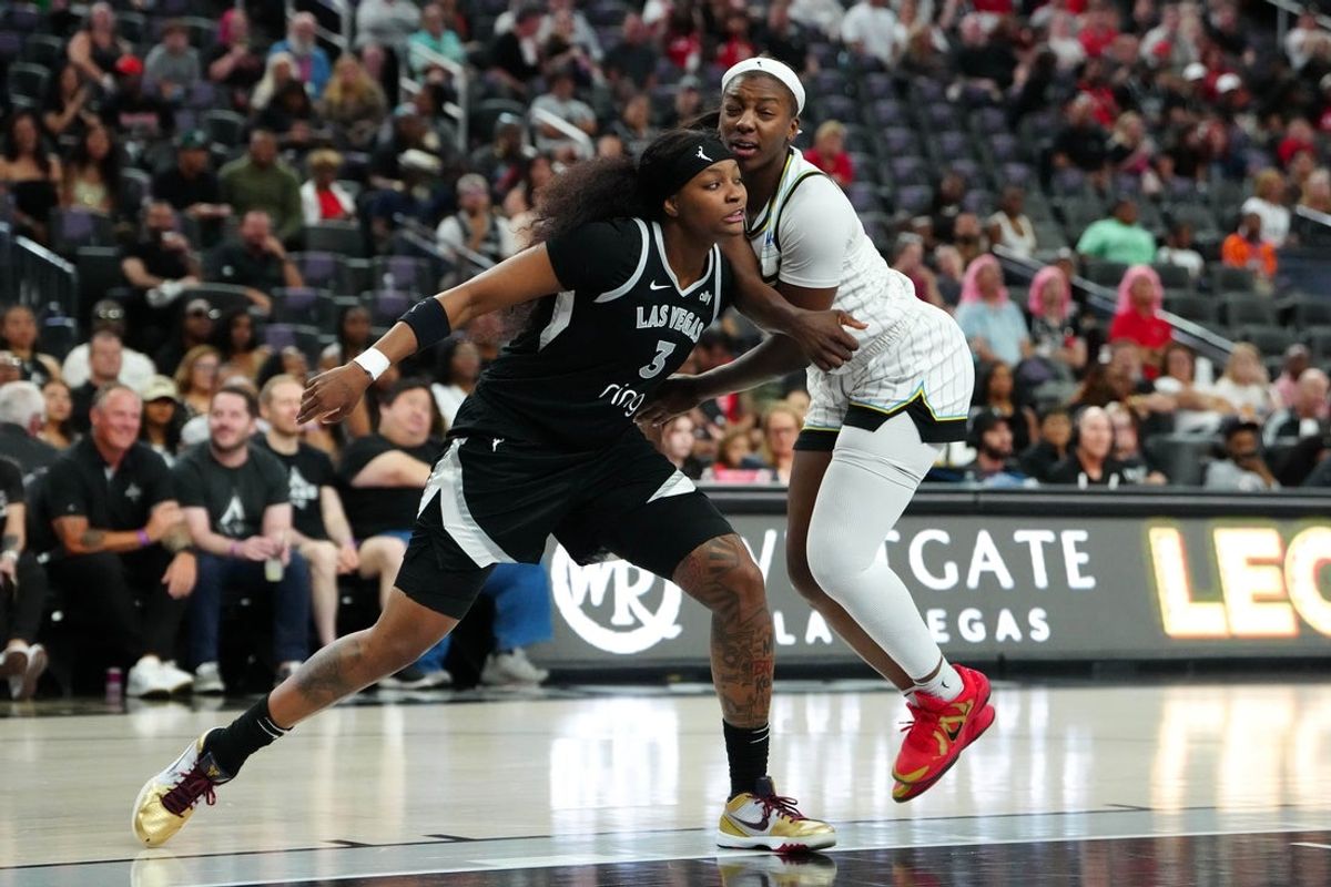 Sep 9, 2025; Las Vegas, Nevada, USA; Las Vegas Aces forward NaLyssa Smith (3) blocks out Chicago Sky forward Michaela Onyenwere (12) during a second quarter free throw attempt at T-Mobile Arena. Mandatory Credit: Stephen R. Sylvanie-Imagn Images