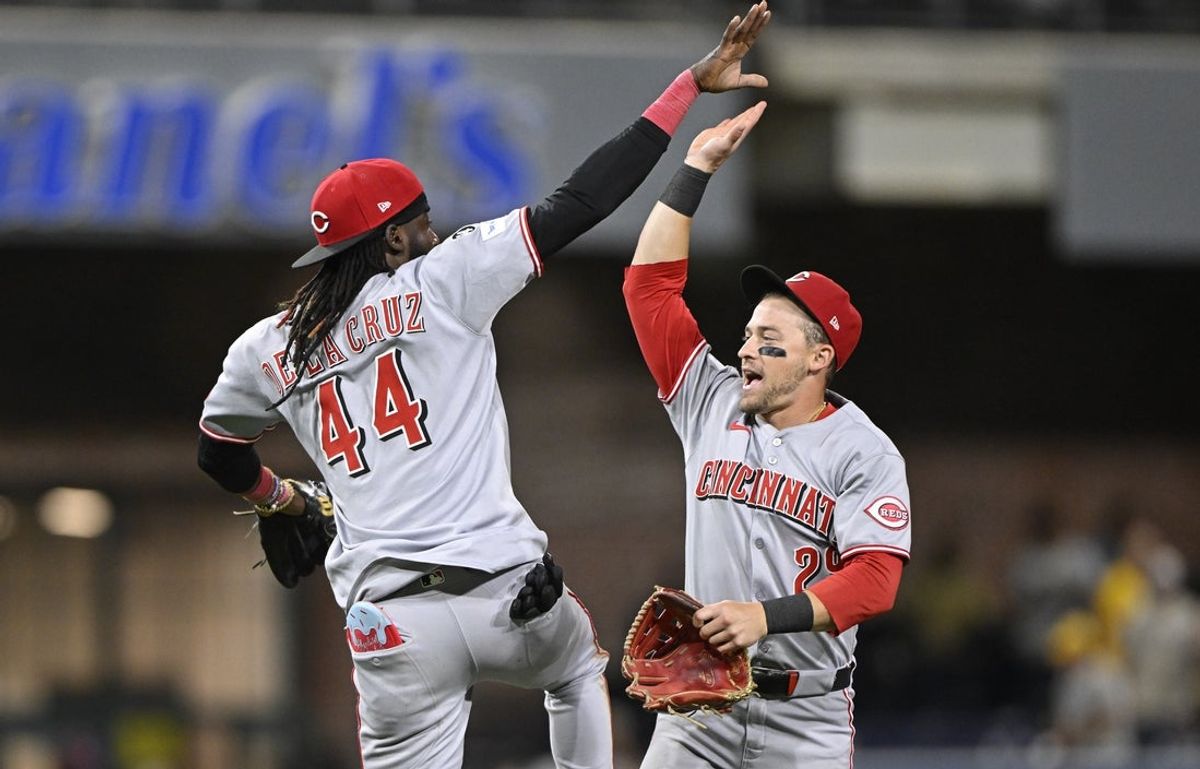 Sep 9, 2025; San Diego, California, USA; Cincinnati Reds shortstop Elly De La Cruz (44) and TJ Friedl (29) celebrate after the Reds beat the San Diego Padres at Petco Park. Mandatory Credit: Denis Poroy-Imagn Images