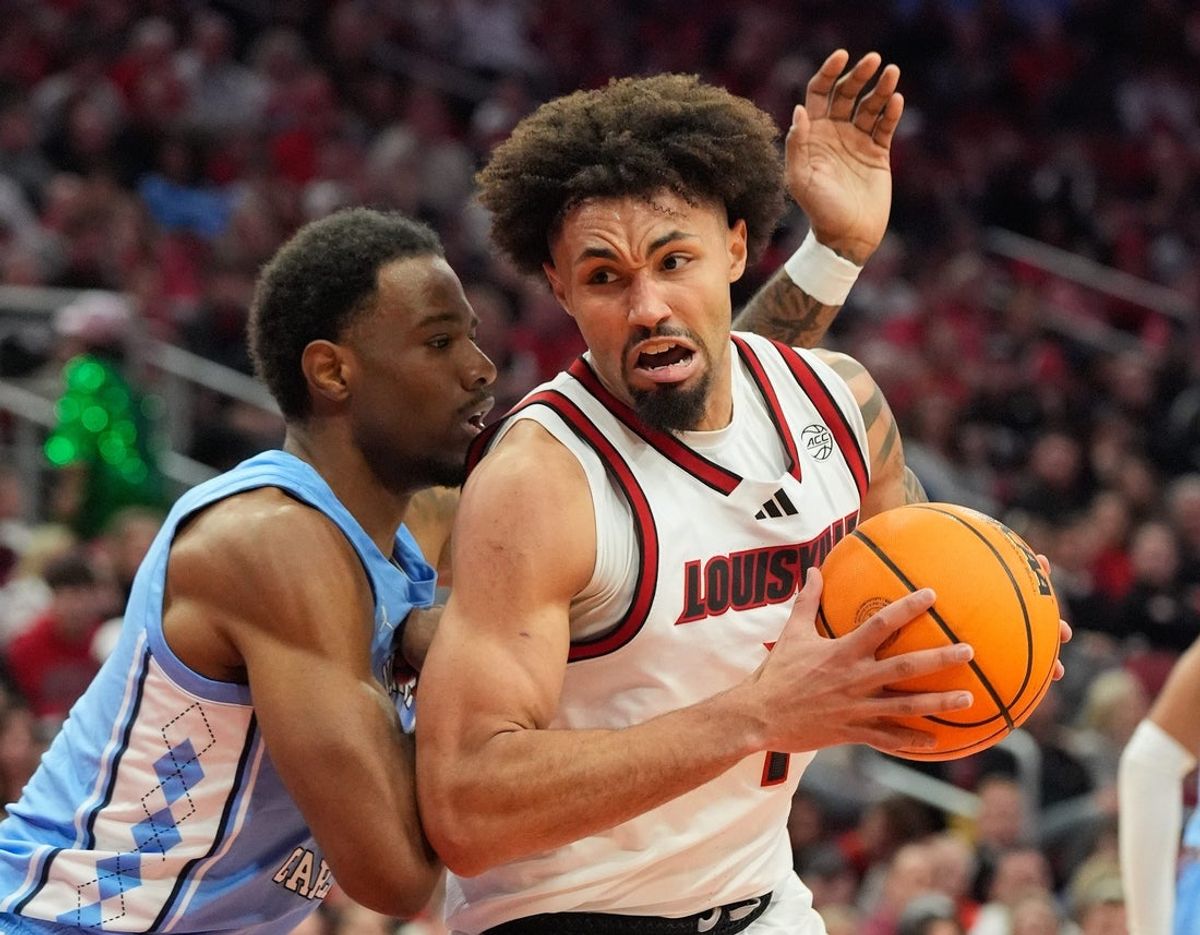 Louisville J'Vonne Hadley looks for an outlet against North Carolina in the first half. January 1, 2025