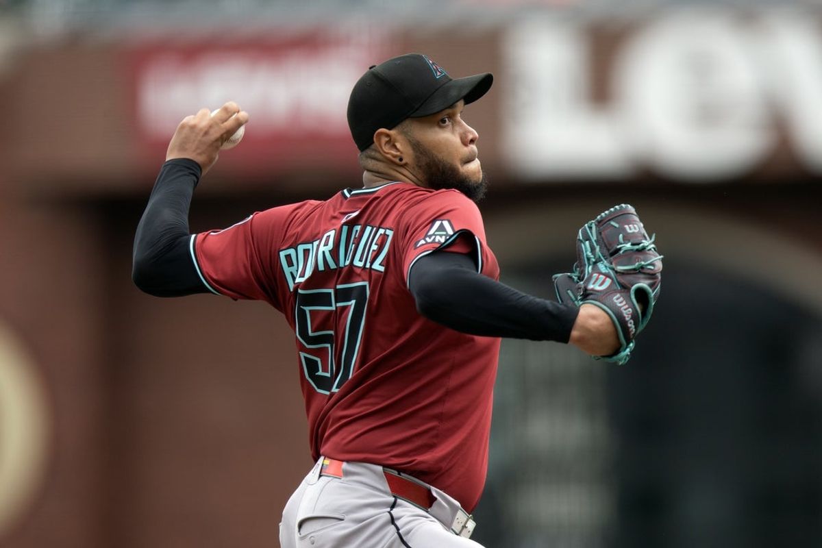 Sep 10, 2025; San Francisco, California, USA; Arizona Diamondbacks pitcher starting Eduardo Rodriguez (57) delivers a pitch against the San Francisco Giants during the second inning at Oracle Park. Mandatory Credit: D. Ross Cameron-Imagn Images