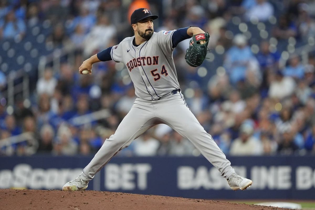 Sep 10, 2025; Toronto, Ontario, CAN; Houston Astros starting pitcher Jason Alexander (54) pitches to the Toronto Blue Jays during the first inning at Rogers Centre. Mandatory Credit: John E. Sokolowski-Imagn Images