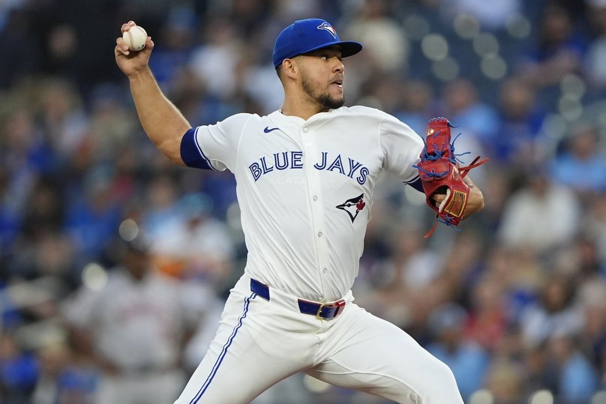 Sep 10, 2025; Toronto, Ontario, CAN; Toronto Blue Jays starting pitcher Jose Berrios (17) pitches to the Houston Astros during the first inning at Rogers Centre. Mandatory Credit: John E. Sokolowski-Imagn Images