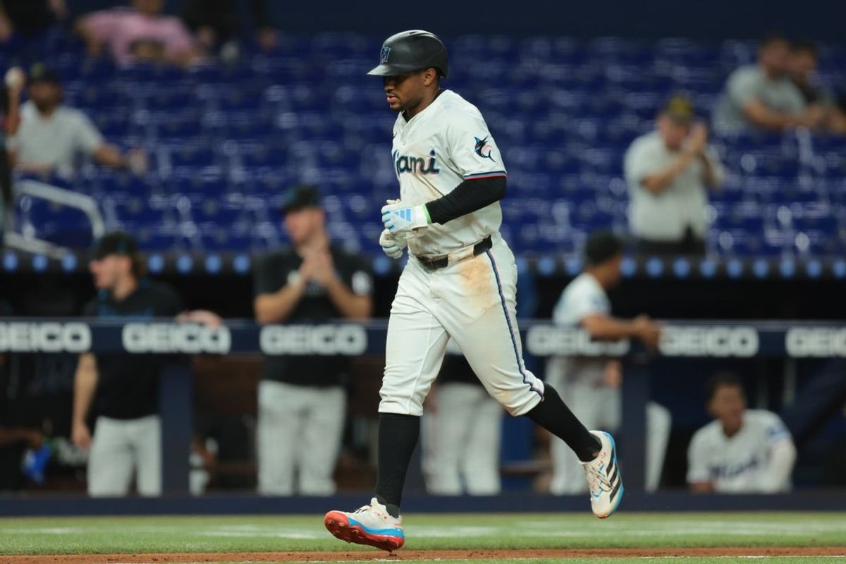 Sep 10, 2025; Miami, Florida, USA; Miami Marlins second baseman Xavier Edwards (9) circles the bases after hitting a three-run home run against the Washington Nationals during the eighth inning at loanDepot Park. Mandatory Credit: Sam Navarro-Imagn Images