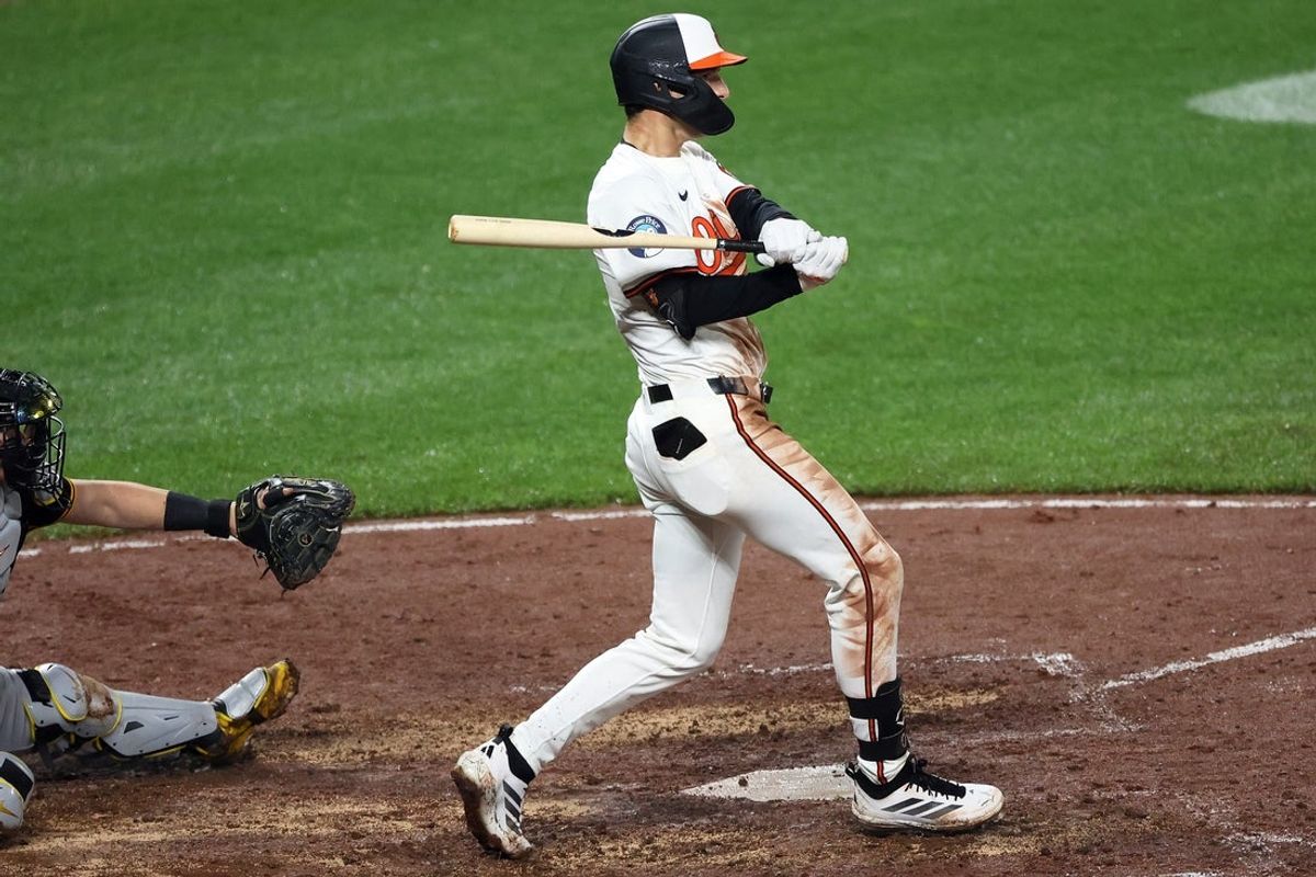 Sep 10, 2025; Baltimore, Maryland, USA; Baltimore Orioles outfielder Dylan Beavers (12) hits a walk off RBI single during a game against Pittsburgh Pirates at Oriole Park at Camden Yards. Mandatory Credit: Daniel Kucin Jr.-Imagn Images